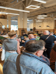 Moscow families captured in routine food court, travel moments