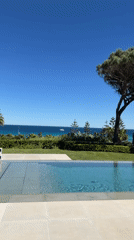 Poolside Mediterranean views and dining prep captured in Ramatuelle