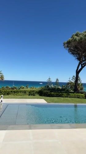 Poolside Mediterranean views and dining prep captured in Ramatuelle