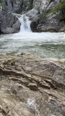 Man documents waterfall visit with selfies in Medven, Bulgaria