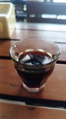 Early morning cafe meal documented in Indonesian village