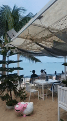 Casual beachside moments captured in Baan Mae Nam, Thailand
