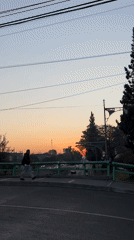 Man views Mexico City traffic from overpass during morning hours