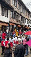 Girls in traditional Bulgarian costumes gather in Veliko Tarnovo