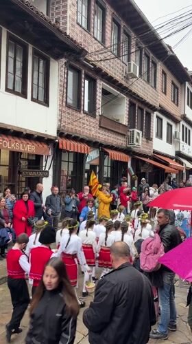 Girls in traditional Bulgarian costumes gather in Veliko Tarnovo