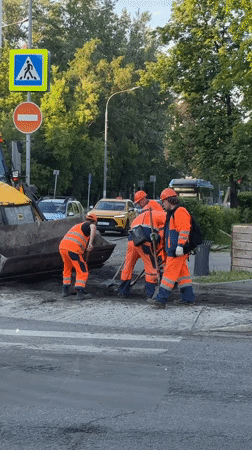 Road crew conducts maintenance work in Dolgoprudny, Russia