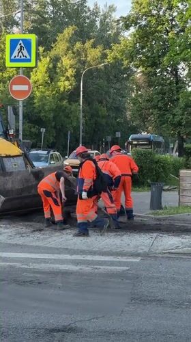 Road crew conducts maintenance work in Dolgoprudny, Russia