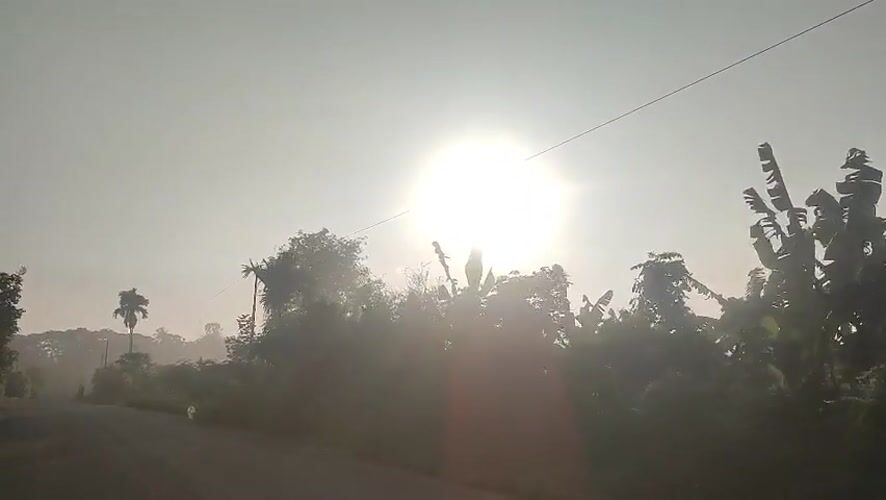 Sunrise road scene captured in rural Indonesian village