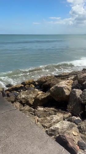 Surfer rides waves, wipes out near Kuta coastline