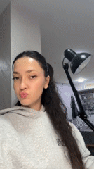 Woman showcases new acrylic nails in Yerevan beauty session