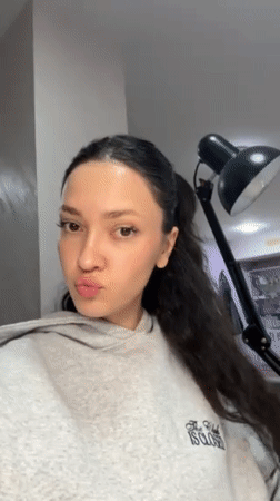 Woman showcases new acrylic nails in Yerevan beauty session