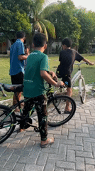Morning street life across two East Java neighborhoods
