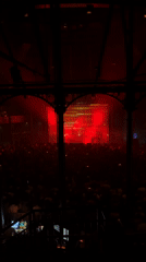 Indoor concert event captured from elevated view in London