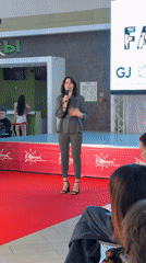 Woman delivers presentation on stage in Kazan