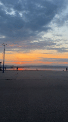 Chaikovsky residents capture sunset moments along waterfront promenade