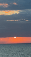 Dramatic Ocean Sunset Captured in 22-Image Sequence Near Gulf