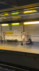 Woman performs solo at empty Buenos Aires subway station