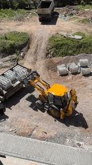 Construction crew moves concrete blocks at Sofia building site