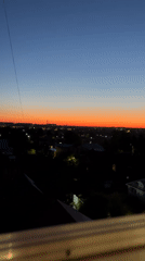 Sunset over Klin, Russia, from a balcony vantage point