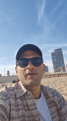 Casual beach day captured in Barcelona on May afternoon