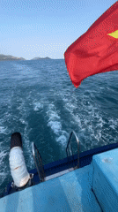 Boat trip with Vietnamese flag recorded near Nha Trang