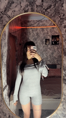 Woman takes mirror selfie in Blizhnii Khutor, Moldova