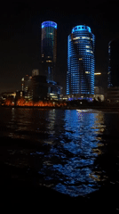 Nighttime river views captured along illuminated Yekaterinburg waterfront