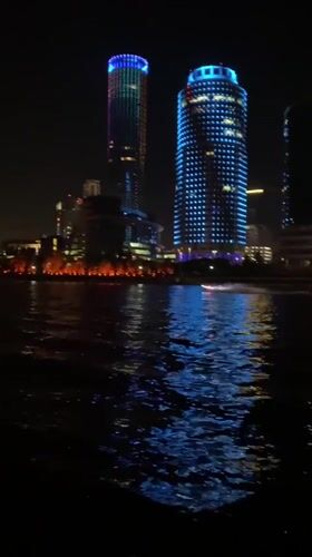Nighttime river views captured along illuminated Yekaterinburg waterfront