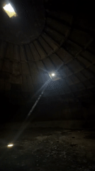 Tourist explores historic stone dome interior in Tbilisi