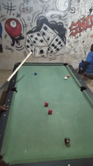 Pool game underway in Akwanga, Nigeria indoor venue