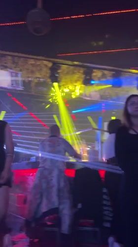 Nightclub scene captured in Nesebar with colorful flashing lights
