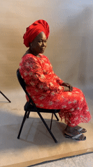 Woman poses for portrait session at Nigerian photo studio