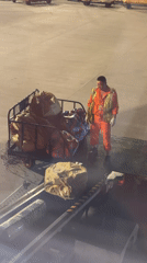 Baggage handling on a conveyor belt in Pudong