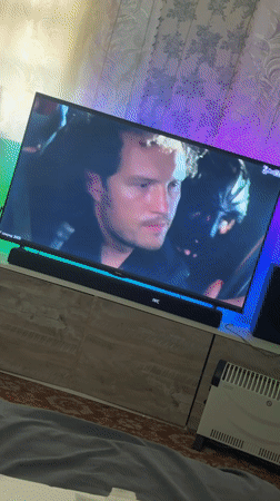 Action movie scenes broadcast on television in Makiivka, Ukraine