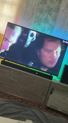 Action movie scenes broadcast on television in Makiivka, Ukraine