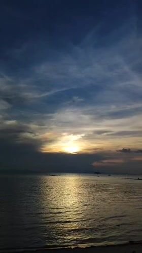 Sunset captured over water in Nathon, Thailand