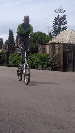 Kids on bikes in a Gura Top residential street