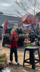 Daily life unfolds at Ubud markets as vendors, tourists mingle