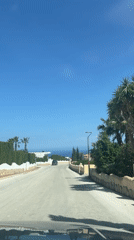 Driver records peaceful residential street in Spanish coastal community