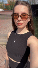 Woman takes selfie at war memorial in Klin, Russia
