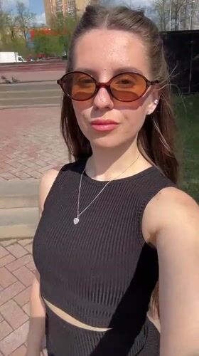Woman takes selfie at war memorial in Klin, Russia