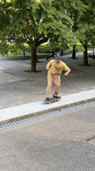Skateboarder performs aerial trick in Buenos Aires park