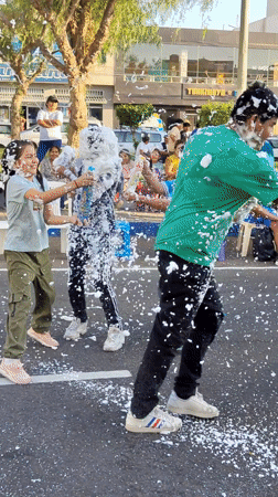 Street foam fight captured in Tacna, Peru
