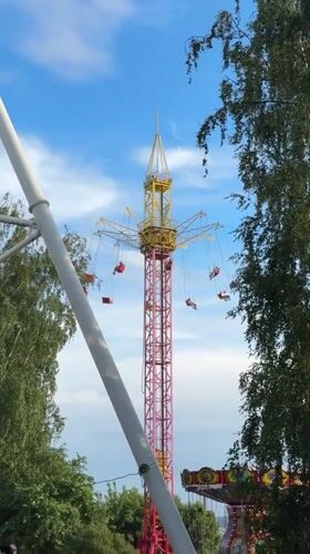 Visitors enjoy afternoon at Izhevsk amusement park rides and attractions
