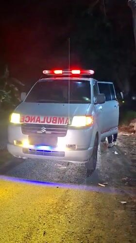 Emergency ambulance responds at night in rural Indonesian village