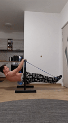 Man performs indoor calisthenics workout in pajamas in Burgas