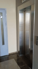 Morning elevator encounter amid city construction activity documented