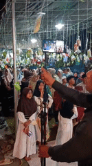 Community celebration with live music in Bululawang, Indonesia