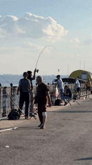 Afternoon activities along Saratov's Volga River waterfront promenade