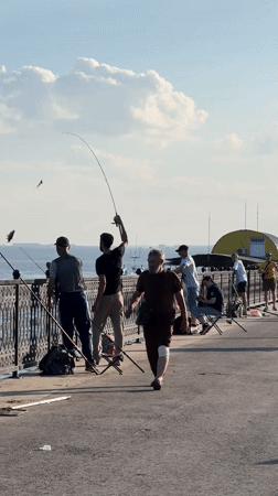Afternoon activities along Saratov's Volga River waterfront promenade
